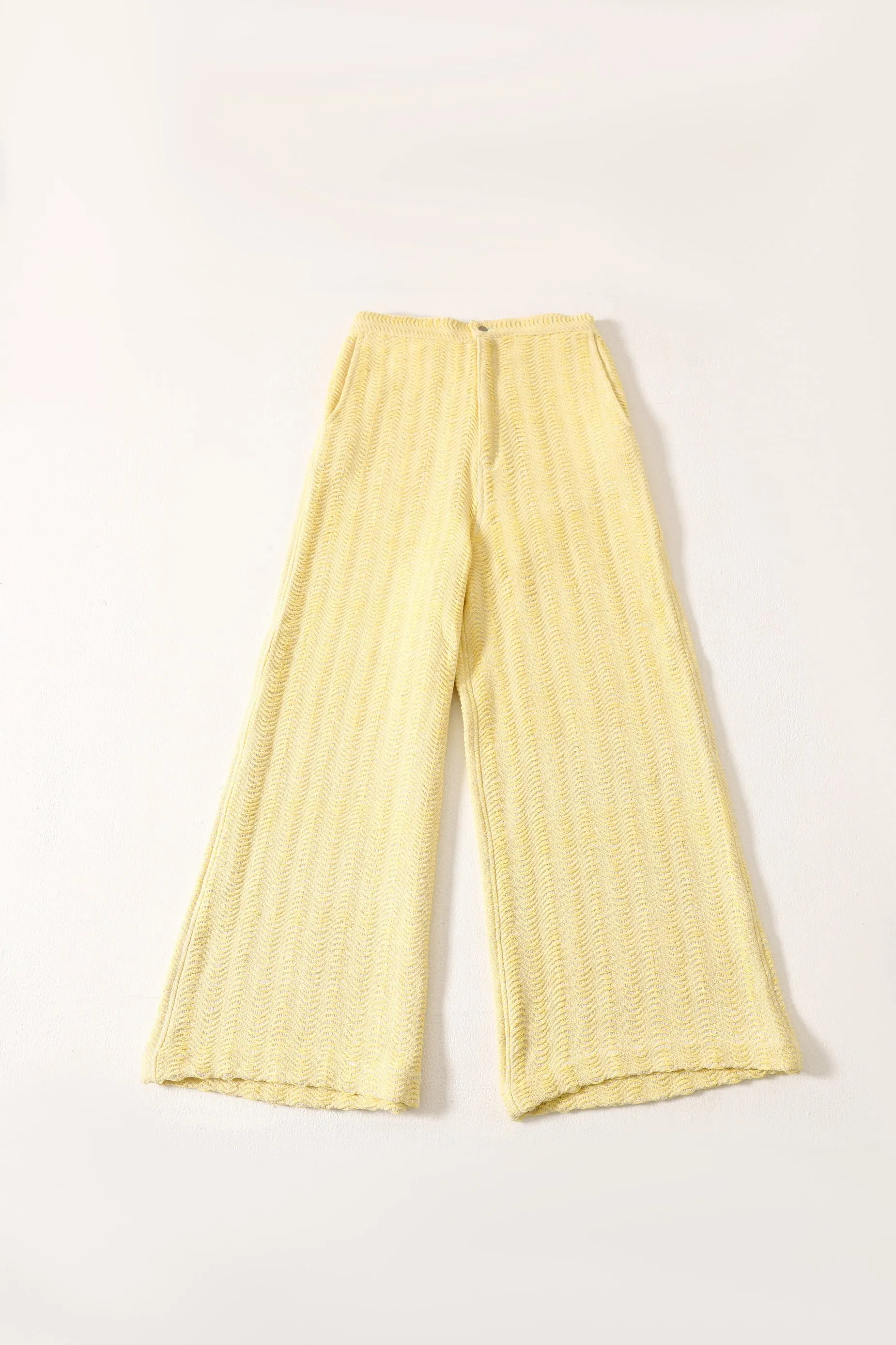 HANDWOVEN FLARED DOBBY TROUSERS