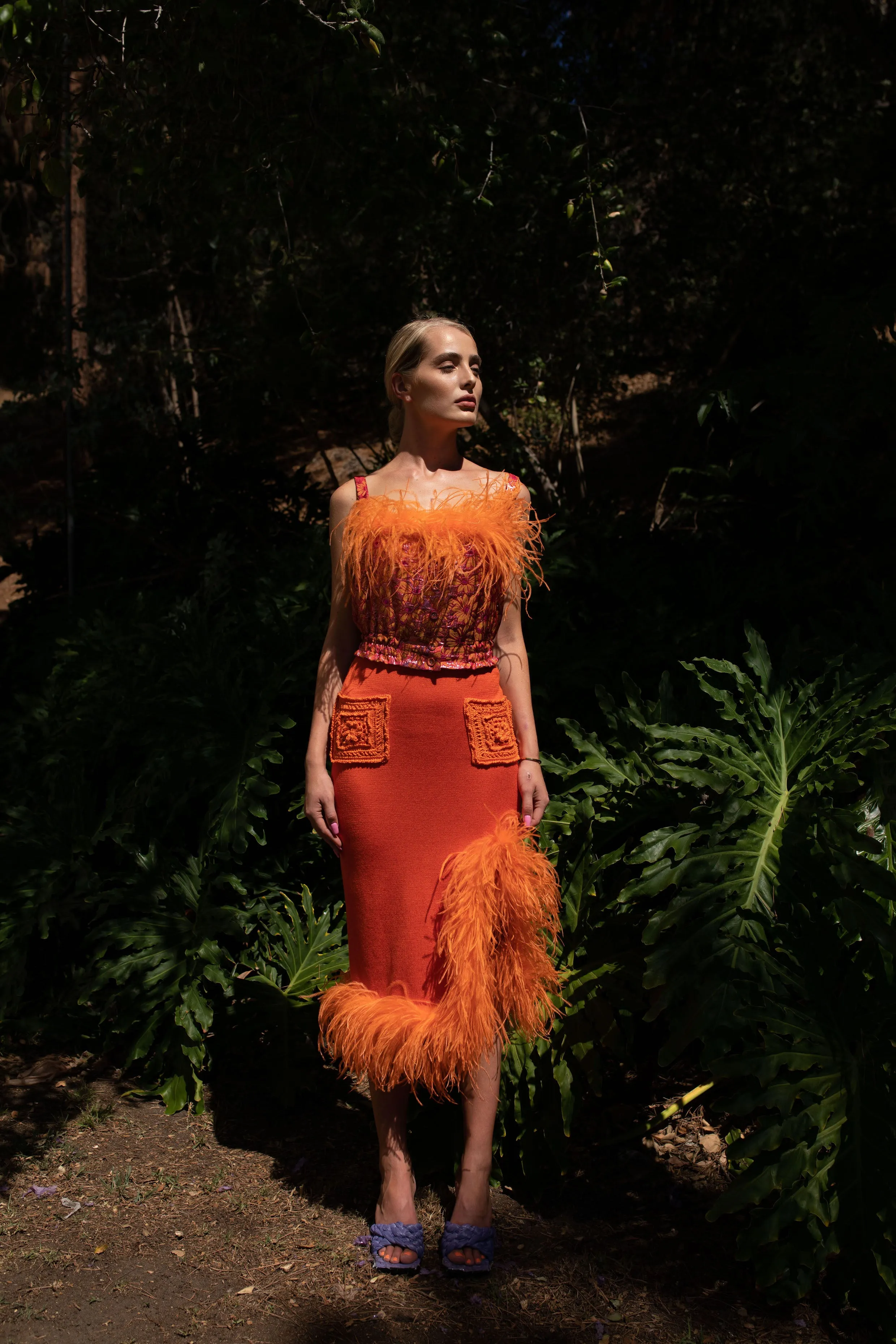 Orange flower top with feather details